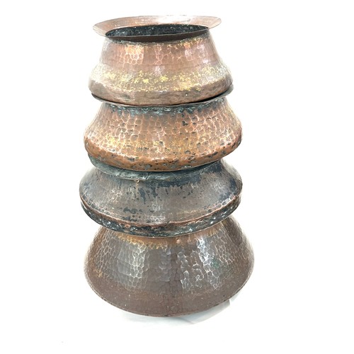 192 - Four Indian copper cooking pots largest measures approx 9 inches tall by 11 inches diameter