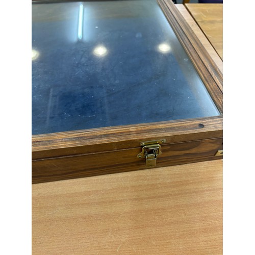 243 - Vintage wooden display case measures approximately 33inches wide  21 inches depth  4 inches tall