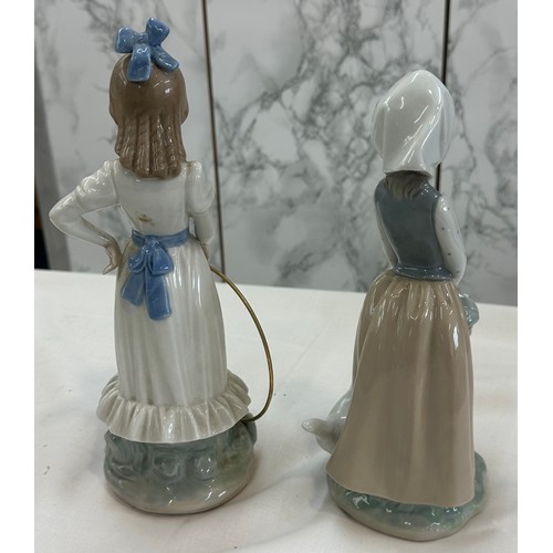 28 - Two Nao porcelain figures overall height of tallest 9 inches