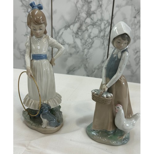 28 - Two Nao porcelain figures overall height of tallest 9 inches