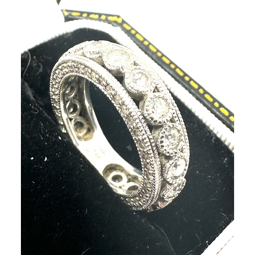 125 - 14ct white gold eternity ring set with est 1.2 ct weight approx 7g