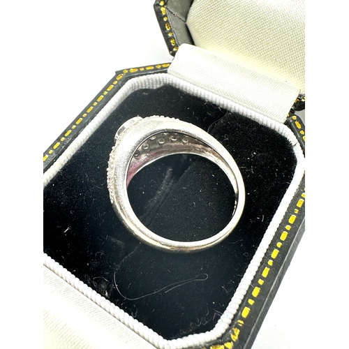 127 - 18ct white gold ruby & diamond ring ruby measures approx 7mm by 5mm set with diamond shoulders weigh... 