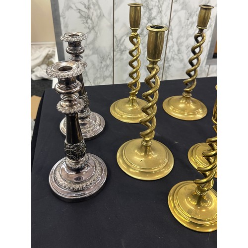 122 - Selection of brass barley twist and EPNS candle sticks and a candelabra