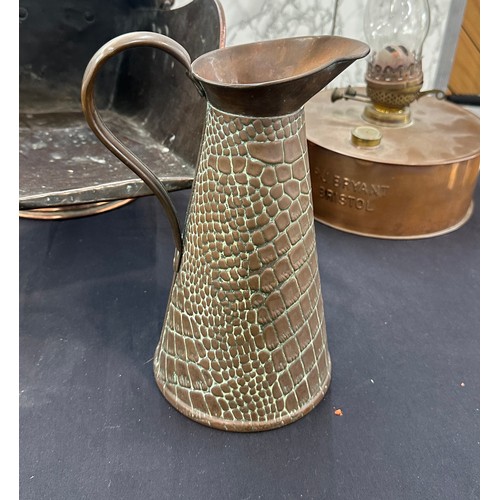 147 - Selection of copper items to include a coal scuttle, ' P&J Byrant Bristol' oil lamp and a jug