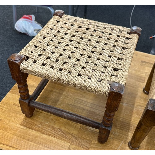 587 - Two wicker and wood foot stools largest measures approx 9 inches tall by 19 wide