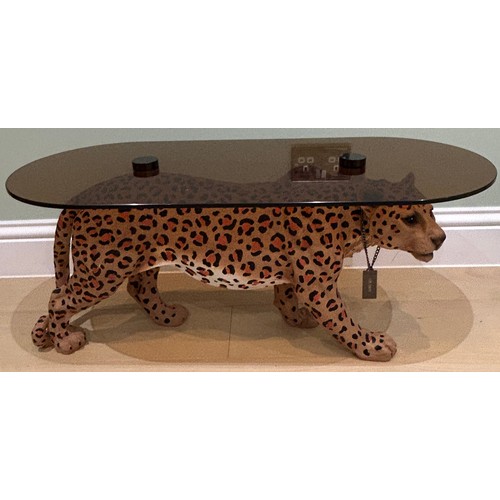 586 - Leopard design designer style coffee table, approximate length 35 inches, Height 15 inches, , Width ... 