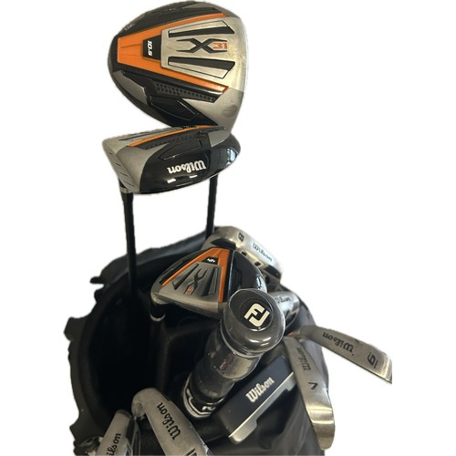 245 - Set Wilson golf clubs with case, club covers