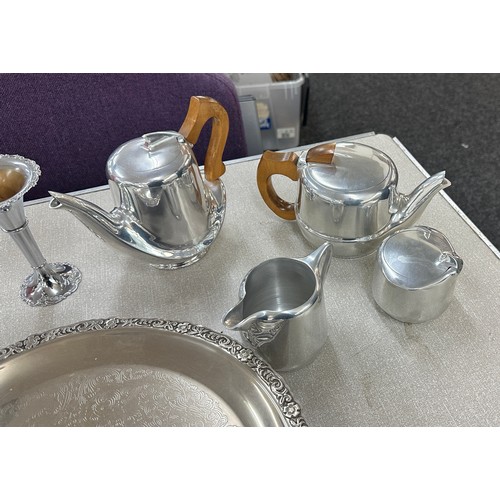 153 - Selection of EPNS items to include coffee set, candle sticks and a tray