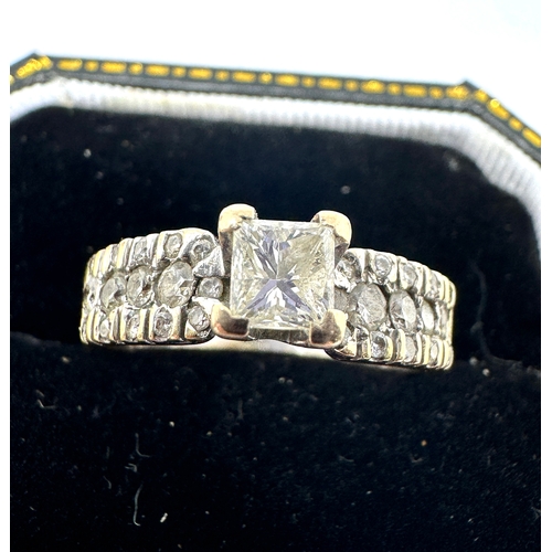 134 - 18ct gold diamond ring central diamond measures 4mm by 4mm with diamond shoulders approx weight 4g