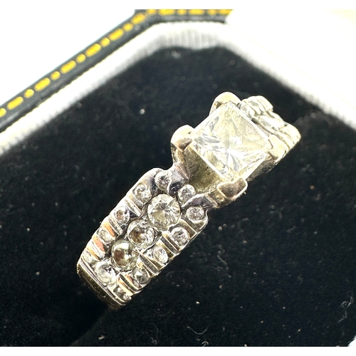 134 - 18ct gold diamond ring central diamond measures 4mm by 4mm with diamond shoulders approx weight 4g