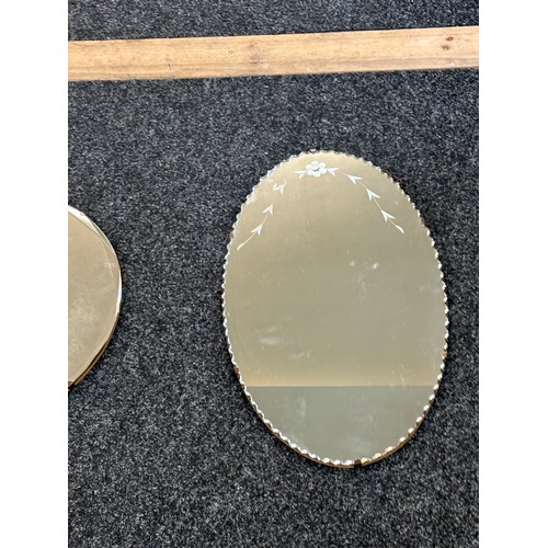 69 - 2 Bevelled edge mirrors largest measures approximately 20 inches tall 12 inches wide