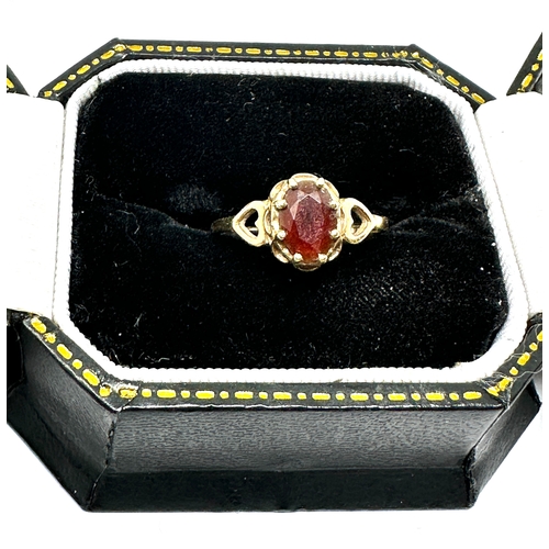 151 - 9ct gold garnet ring weight 1.2