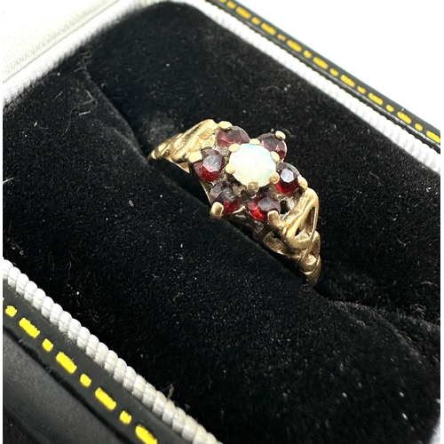 152 - 9ct gold opal & garnet ring weight 1.3g