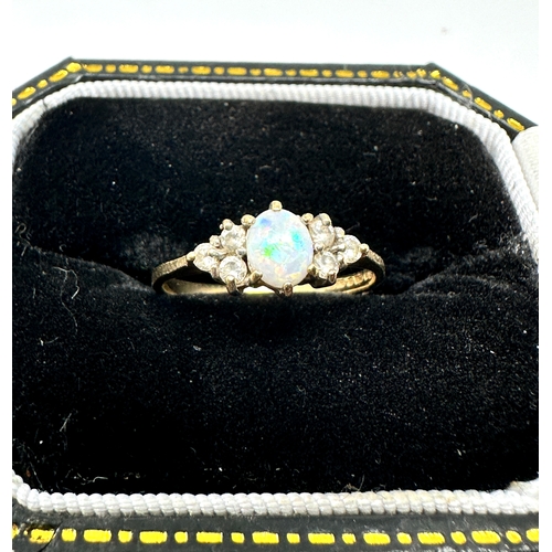 153 - 9ct gold opal & white gemstone ring weight 1.1g