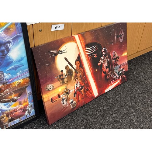 253 - Starwars canvas and a Framed star wars poster largest measures approximately 38 inches tall 26 inche... 