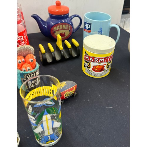 154 - Selection of advertising items to include Marmite tea pot, Heinz baked beans, set of 6 Coca Cola gla... 