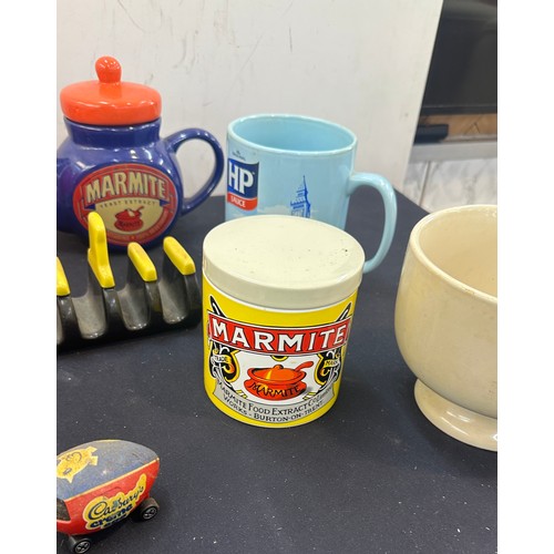 154 - Selection of advertising items to include Marmite tea pot, Heinz baked beans, set of 6 Coca Cola gla... 