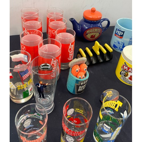 154 - Selection of advertising items to include Marmite tea pot, Heinz baked beans, set of 6 Coca Cola gla... 