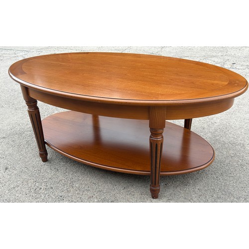 545 - Mahogany oval coffee table with shelf beneath, very clean condition, approximate measurements: Heigh... 