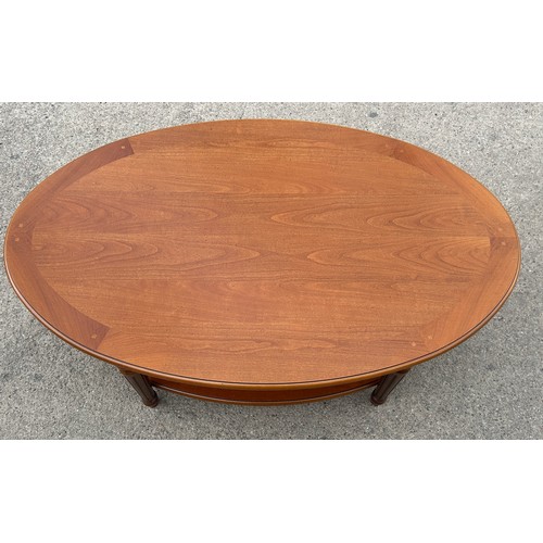 545 - Mahogany oval coffee table with shelf beneath, very clean condition, approximate measurements: Heigh... 