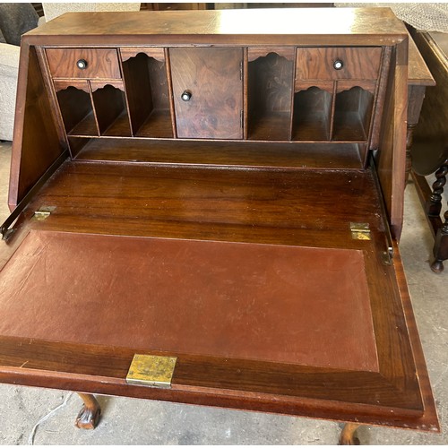 563 - Walnut 3 drawer bureau , ball and claw feet, approximate measurements: Height 41 inches, Width 31 in... 