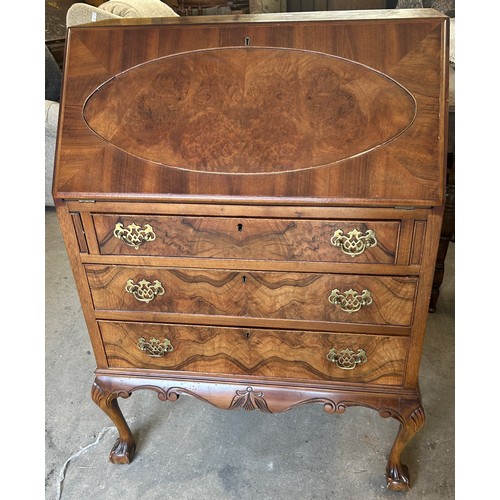 563 - Walnut 3 drawer bureau , ball and claw feet, approximate measurements: Height 41 inches, Width 31 in... 