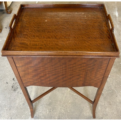 564 - Flamed Mahogany sewing table, approximate measurements: Height 30 inches, width 19 inches, Depth 15 ... 