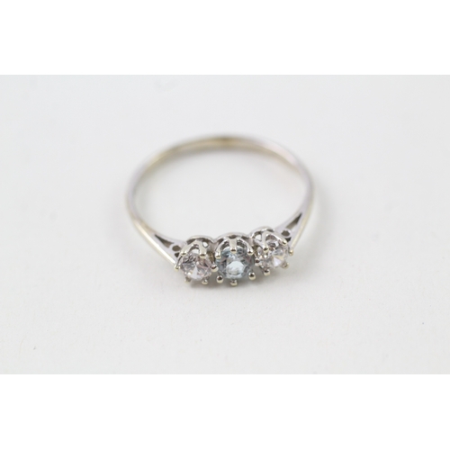 185 - 9ct white gold topaz & cubic zirconia three stone ring (1.6g)