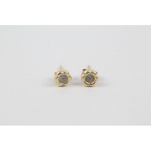 189 - 9ct gold blue topaz stud earrings (0.4g)