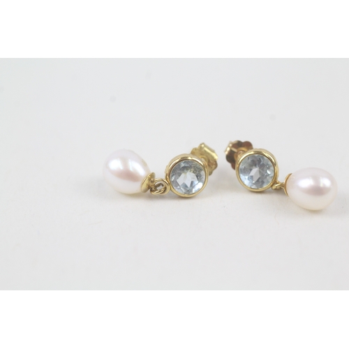 195 - 9ct gold blue topaz & cultured pearl drop earrings (1.1g)