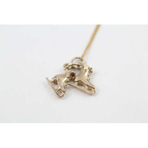 201 - 9ct gold ice skate pendant necklace (2.1g)