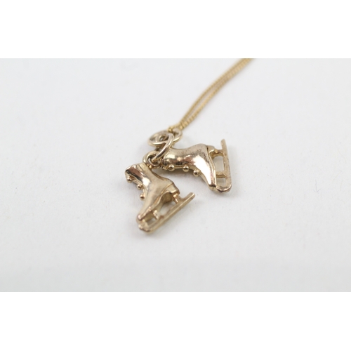 201 - 9ct gold ice skate pendant necklace (2.1g)