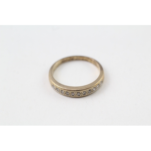 217 - 9ct gold diamond half eternity rign (1.7g)