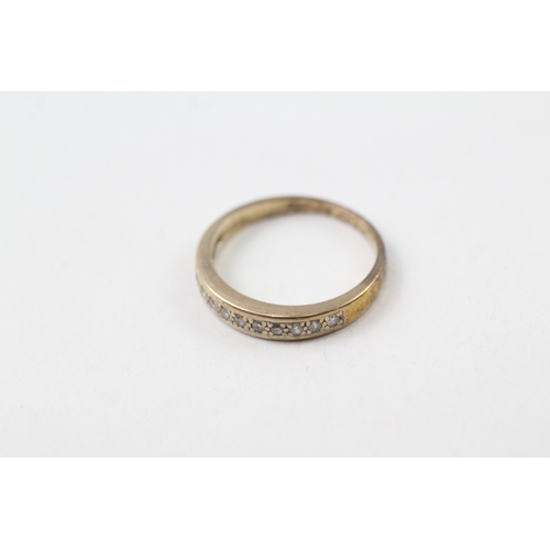 217 - 9ct gold diamond half eternity rign (1.7g)