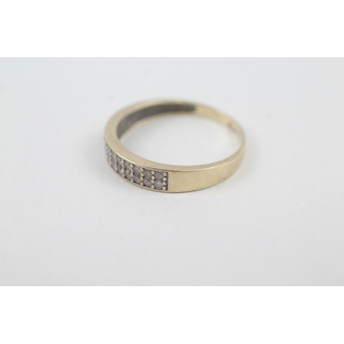 225 - 9ct gold cubic zirconia two row ring (1.5g)