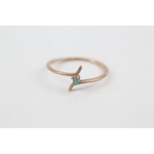 241 - 9ct gold emerald dress ring (0.58g)