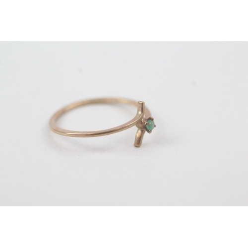 241 - 9ct gold emerald dress ring (0.58g)