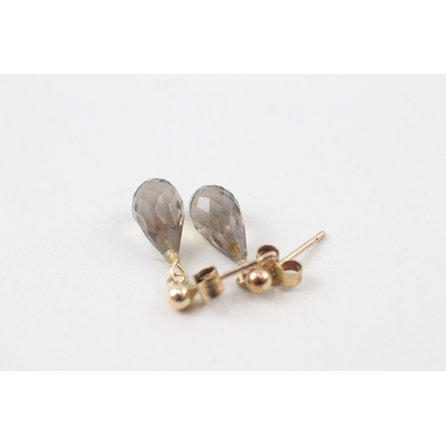 263 - 9ct gold facted smokey quartz drop earrings (1.3g)