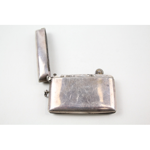 23 - .925 sterling silver cased petrol lighter