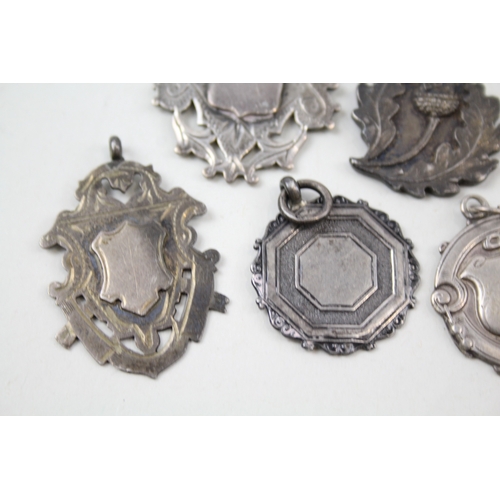 32 - 7 x .925 sterling silver fobs / medallions