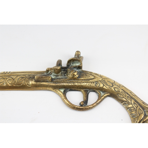 448 - Brass Ornamental Wall Pistols x 3 1050g