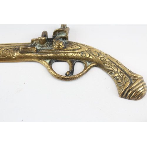 448 - Brass Ornamental Wall Pistols x 3 1050g