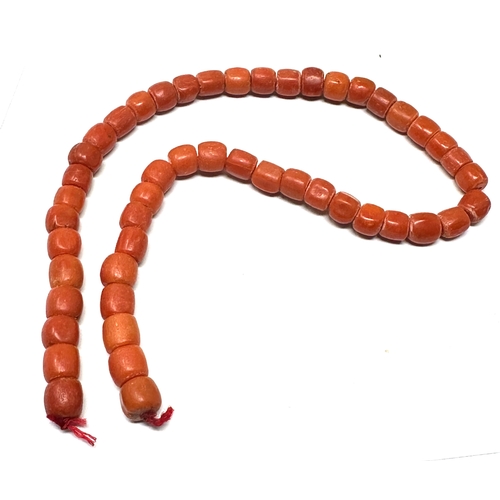 166 - Antique coral beads bracelet / necklace weight 34g beads measure approx 7mm by 6mm length 13ins long