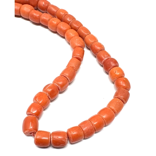 166 - Antique coral beads bracelet / necklace weight 34g beads measure approx 7mm by 6mm length 13ins long