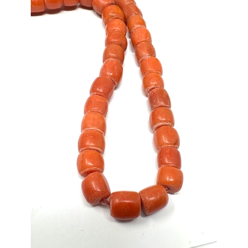 167 - Antique coral beads bracelet / necklace weight 35g beads measure approx 7mm by 6mm length 13ins long