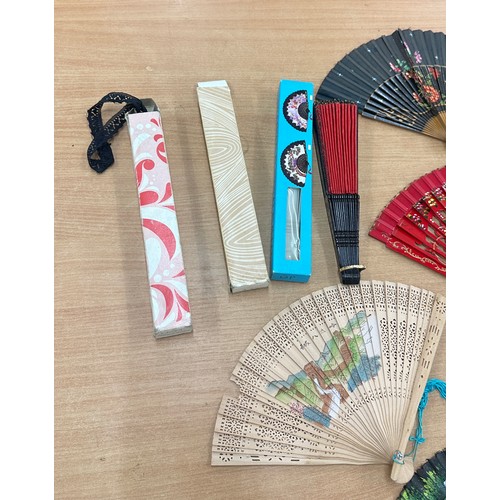 54 - Large selection of international fans