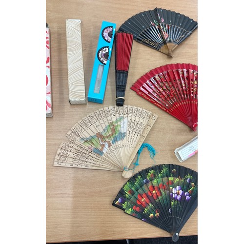 54 - Large selection of international fans