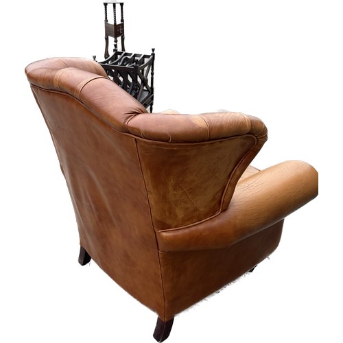 595 - Tan leather button back fire side chair