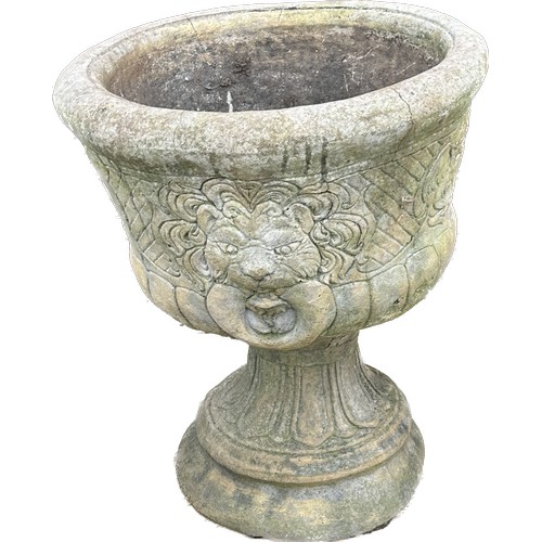 100D - Two concrete garden planters with lion head details overall height 26 inches