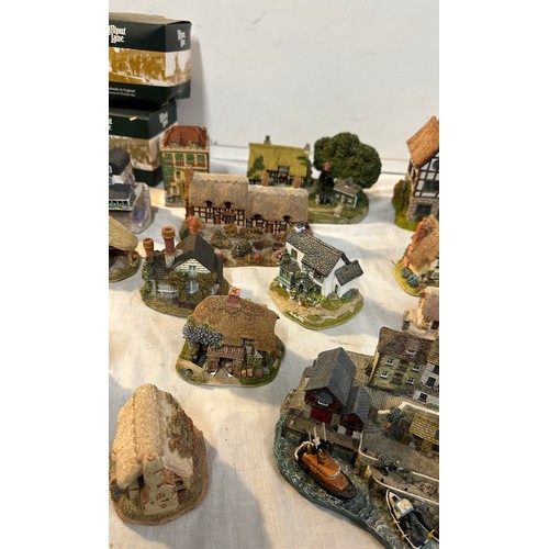 181 - Large selection of Lilli put lane cottages some in original boxes to include ' The Seafarers Friend'... 